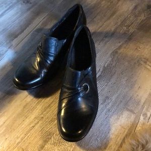 Clark’s black leather slip-on loafer/ankle boot.